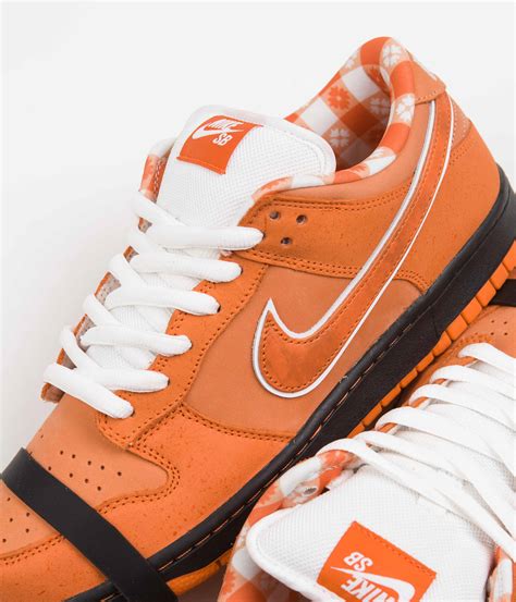 orange shoes nike.